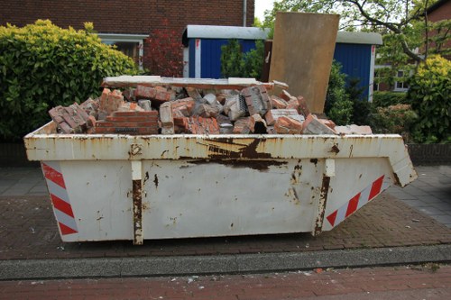 Professionals performing flat clearance in a modern Finsbury Park apartment